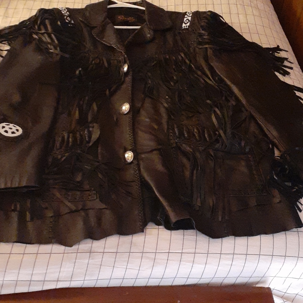 100% leather by Scully Leather.